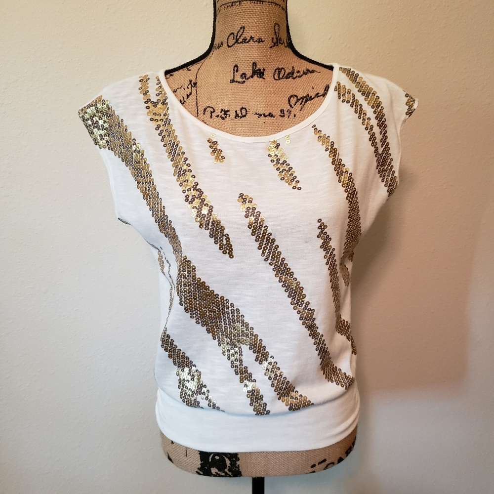 White and gold top